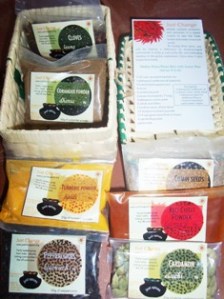 A range of Indian spices in a handmade basket